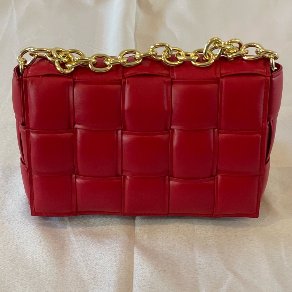 Red weave handbag with gold chain hardware